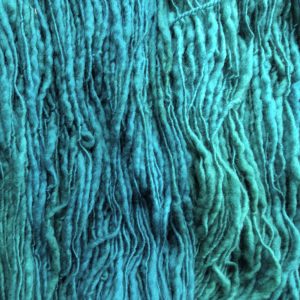 Tide Pool - Mid-tone turquoise/green Corriedale thick and thin slub yarn. Hand-dyed by Triskelion Yarn