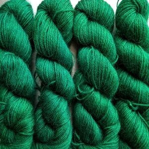 Emerald - Mid- to dark emerald hand-dyed Wensleydale DK/ Double Knit yarn. Hand-dyed by Triskelion Yarn