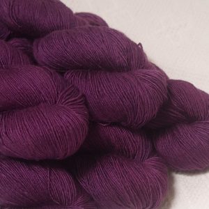 Tyrian Purple - Dark reddish purple Falklands Merino and silk blend yarn. Hand-dyed by Triskelion Yarn.