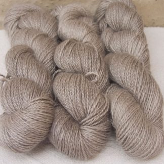 Pebble - Pale greyish brown Baby Alpaca, silk and linen sport weight yarn. Hand-dyed by Triskelion Yarn.