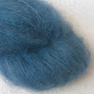 Offing - Mid-toned indigo blue suri alpaca luxury yarn. Hand-dyed by Triskelion Yarn