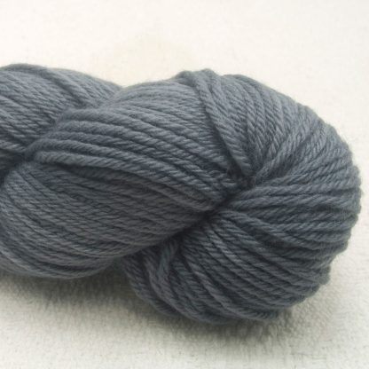 Graphite - Cool, mid-toned grey Corriedale heavy DK/worsted weight yarn. Hand-dyed by Triskelion Studio.