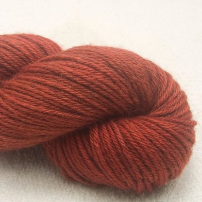 Redwood - Mid to dark russet Corriedale heavy DK/worsted weight yarn. Hand-dyed by Triskelion Studio.