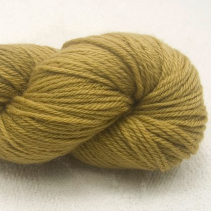 Shore - Light, sandy brown Corriedale heavy DK/worsted weight yarn. Hand-dyed by Triskelion Studio.