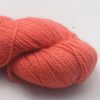 Reef - Light coral pinkish orange Bluefaced Leicester DK (double knit) yarn hand-dyed by Triskelion Yarns