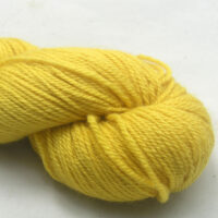 Indian Summer - Light sunny yellow Bluefaced Leicester worsted weight yarn hand-dyed by Triskelion Yarn