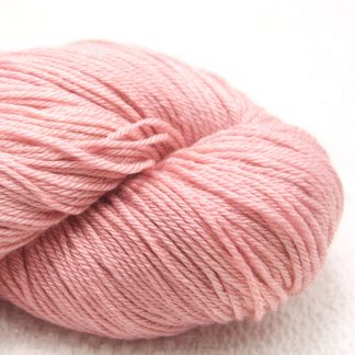 Seashell - Pale shell pink Merino and silk blend 4-ply / fingering weight yarn. Hand-dyed by Triskelion Yarn.