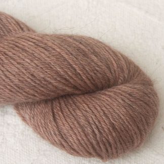 Seashell - Pale shell pink Bluefaced Leicester (BFL) / Gotland aran weight yarn. Hand-dyed by Triskelion Yarn