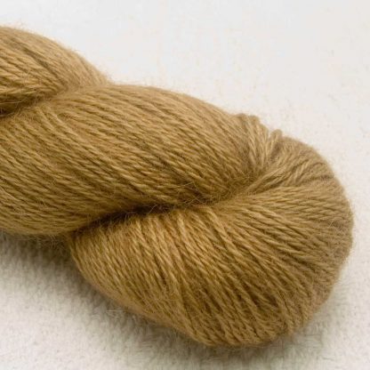 Semi-solid light brown, with oakwood and tawny tones hand-dyed Wensleydale DK/ Double Knit yarn. Hand-dyed by Triskelion Yarn