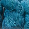 Semi-solid cerulean blue Corriedale thick and thin slub yarn. Hand-dyed by Triskelion Yarn.