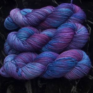 Nebula - Blue, purple and violet variegated superwash British Bluefaced Leicester sportweight yarn. hand-dyed by Triskelion Yarn